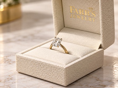 Restored ring displayed in a Farr's Jewelry box